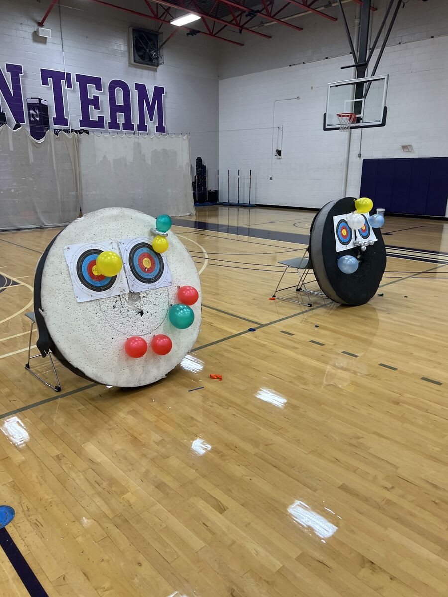 Balloons pinned to targets for a balloon-popping game